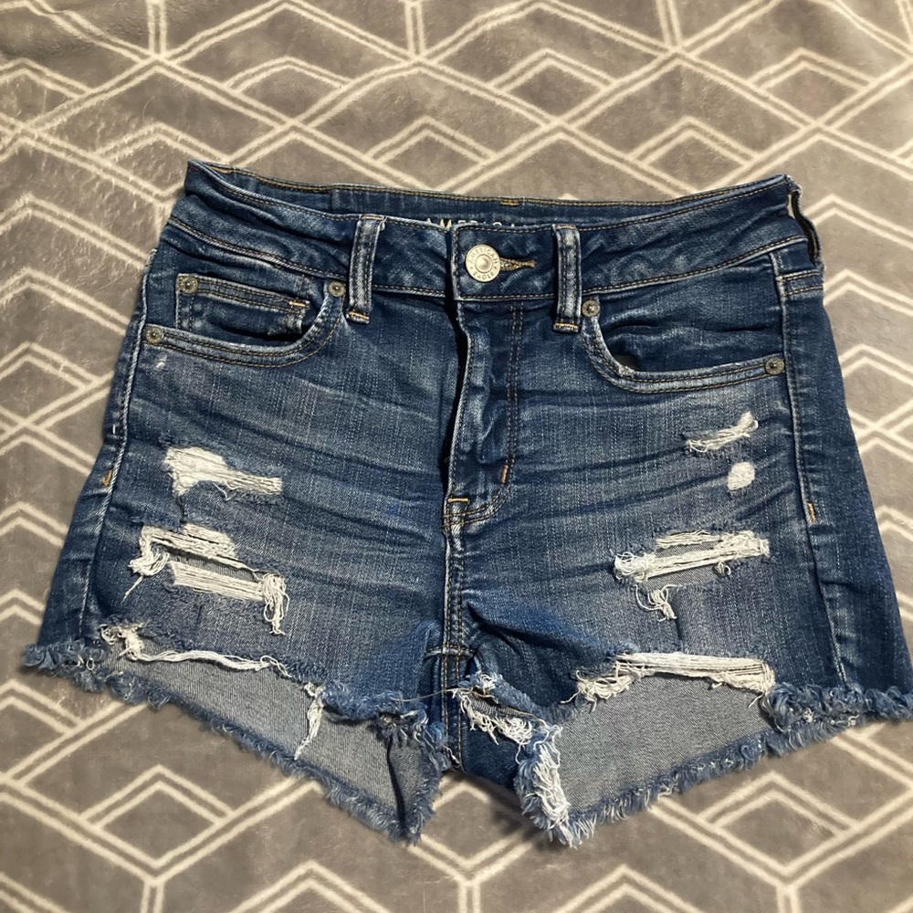 American Eagle next level stretch distressed jean shorts. Good condition.Size 4